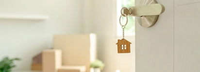 Open front door with keys